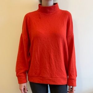 Orange mock neck sweater